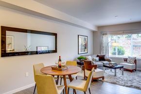 Bothell apartment for rent - A dining room with a round table and chairs.