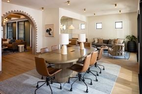 Vista apartment for rent - A modern dining room with a round table and chairs.