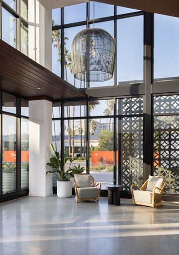San Diego apartment for rent - a living room with chairs and a large window