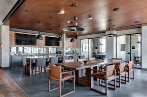 Oakland apartment for rent - a large dining room with a long table and chairs