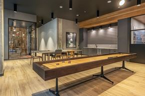 Vancouver apartment for rent - Resident Hub Lounge Shuffleboard - Coen & Columbia