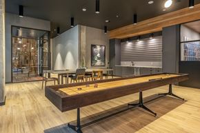 Vancouver apartment for rent - Resident Hub Lounge Shuffleboard - Coen & Columbia
