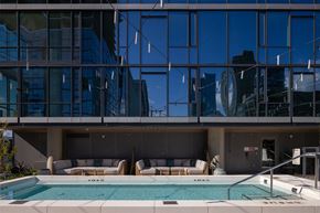 Seattle apartment for rent - the pool at the top of a building next to a glass facade