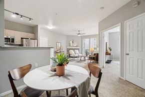 Hillsboro townhouse for rent - A dining room with a white table and chairs.