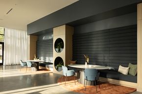 Long Beach apartment for rent - A modern dining area with a round table and chairs.