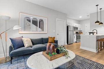 Englewood apartment for rent - a living room with a couch and a table