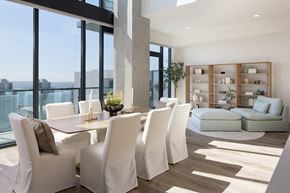 San Diego apartment for rent - A modern dining room with white chairs and a table.