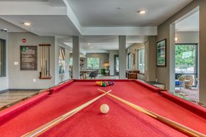 Bothell apartment for rent - A pool table with a white ball in the middle of it.