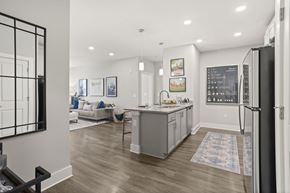 Pendleton apartment for rent - A modern kitchen with a refrigerator on the right side.