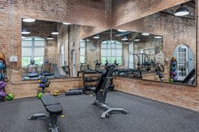 Seneca apartment for rent - Newry Mill private 24 hour gym. Included are bench chairs, free weights, kettlebells, treadmills, and a mirror.