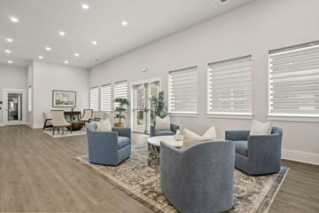 Boiling Springs apartment for rent - A spacious living room with grey couches and a rug.