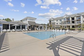 Gated resort-style pool with cabana