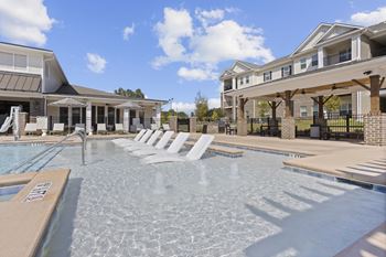 Gated resort-style pool with cabana