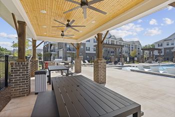 Gated resort-style pool with cabana