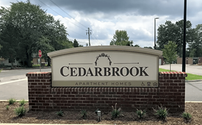 Camden apartment for rent - a sign for cedarbrook apartment homes in front of a street