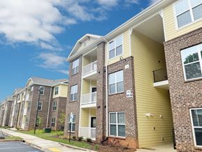 Easley apartment for rent - Apartment building with the number 110 on the front.