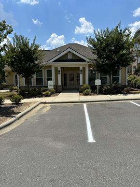 Charlotte apartment for rent - a house with a parking lot in front of it