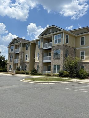 Charlotte apartment for rent - an empty street in front of an apartment building