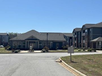 Kings Mountain apartment for rent - A building with a sign in front of it.