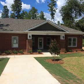 Orangeburg apartment for rent - A house with a brick facade and a white door.