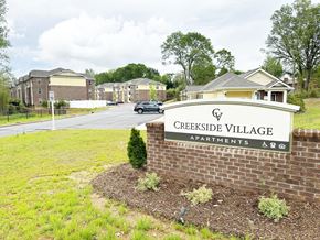 Easley apartment for rent - Creekside Village monument sign, with the property name, in front of the apartment community