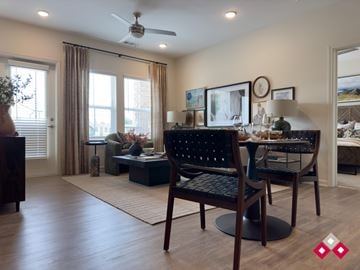 Flat Rock apartment for rent - A living room with a black chair and a wooden floor.