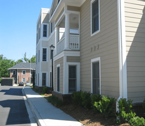 Charleston apartment for rent - a street view of an apartment building with a sidewalk