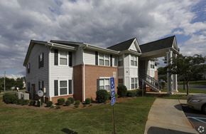 Anderson apartment for rent - a house with a blue and white sign in front of it