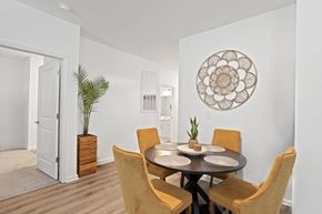 Charlotte townhouse for rent - Ovata at Reedy Creek living room with LVT flooring and ceiling fan