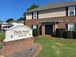 Easley apartment for rent - a park west apartments sign in front of a brick building