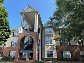 Easley apartment for rent - an apartment building with a red brick facade and a balcony