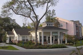 Beaufort apartment for rent - a house with a tree in front of it in a street