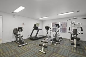 Wichita apartment for rent - A gym with a variety of exercise equipment.