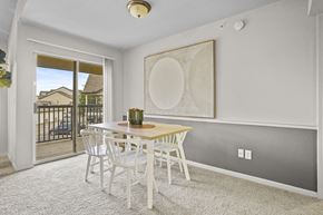 Edmond apartment for rent - A dining room with a table and chairs.