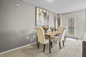 Wichita apartment for rent - A dining room with a table and chairs.