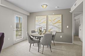 Wichita townhouse for rent - A dining room with a table and chairs.