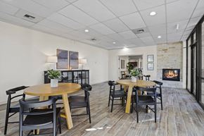 El Paso apartment for rent - A dining room with a wooden table and chairs.
