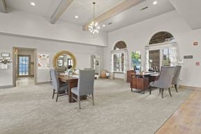 Lubbock apartment for rent - A conference room with a long table and chairs.