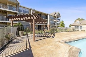 Amarillo apartment for rent - A sunny day at the poolside of apartment complex.