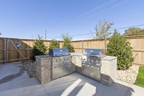 Oklahoma City triplex for rent - A BBQ grill set on a patio.