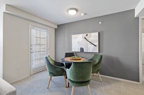 Waco apartment for rent - A dining room with a table set for four.