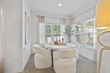 Independence townhouse for rent - a living room with a green couch and a table