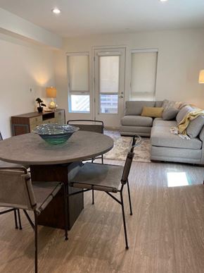 Los Angeles apartment for rent - Modern living room and dining area with a table, chairs and sofa.