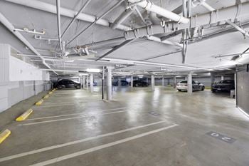 Parking garage with vehicles.