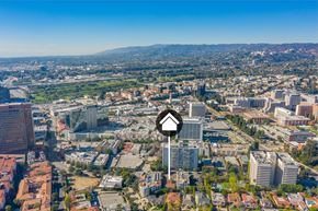 Los Angeles apartment for rent - Aerial view of buildings and homes with property identification marker