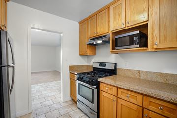 Los Angeles apartment for rent - a kitchen with wood cabinets and stainless steel appliances