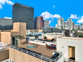 Los Angeles apartment for rent - A view of a cityscape with a pool on the balcony of a building at Peach Tree Court, Los Angeles, 90024