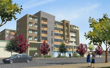San Pedro apartment for rent - a rendering of an apartment building on a city street