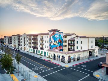 Inglewood apartment for rent - a building with a mural on the side of a street