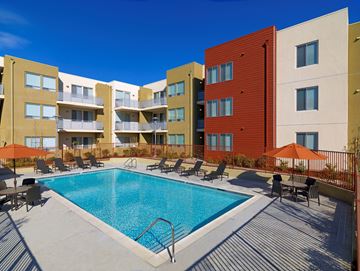 Montclair apartment for rent - a swimming pool in front of an apartment building